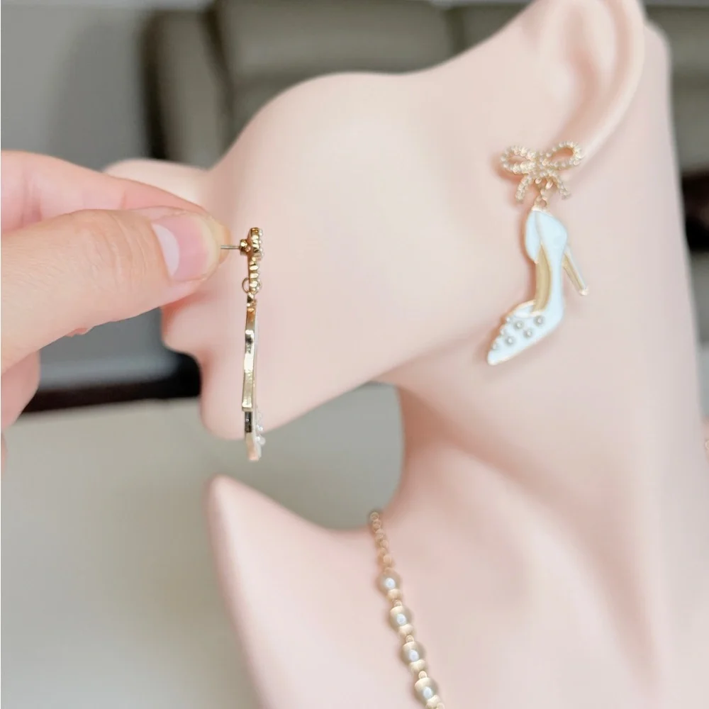 White Enamel High Heel Drop Earrings with Gold Bow